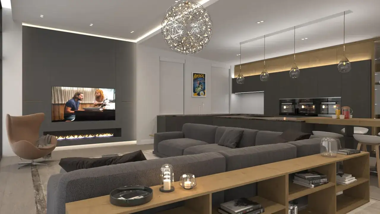 Salón moderno con chimenea, sofá gris y cocina integrada. La domótica Google Home controla la iluminación y el entretenimiento.